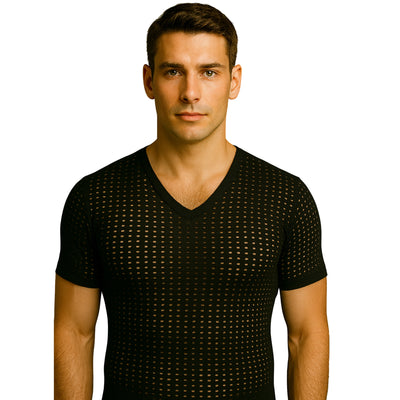 Man wearing a black patterned V-neck shirt on a white background