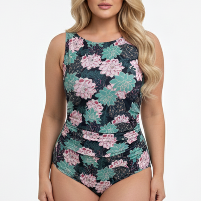 Floral patterned swimsuit worn by a plus-size model on a white background