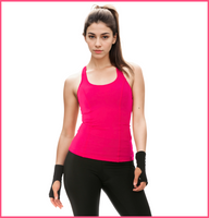 Woman wearing InstantFigure Activewear Compression Racer Back Tank Top AWT020 and Compression Long Pant AWP008 for workout support.